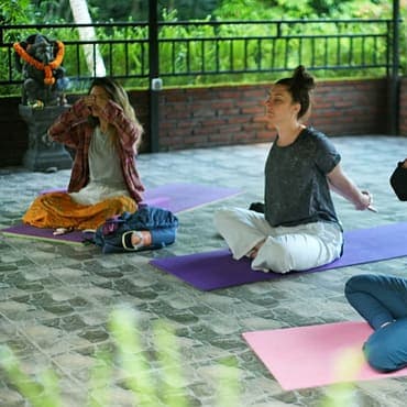 Yuli Hanurawati performing Lotus Pose